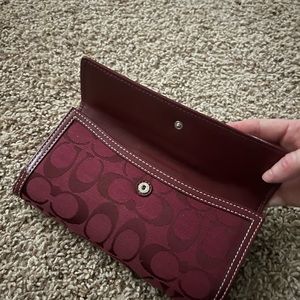 Burgundy coach wallet